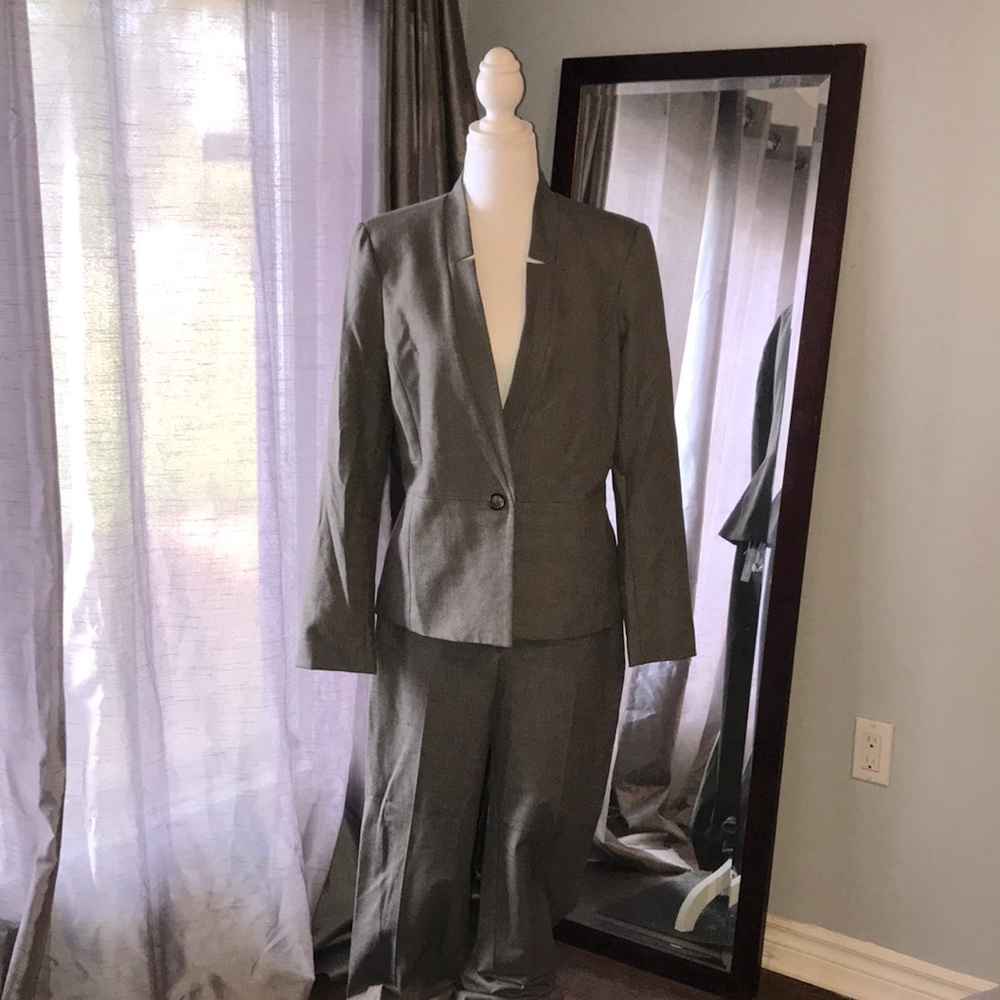 Brand new suit with tags.